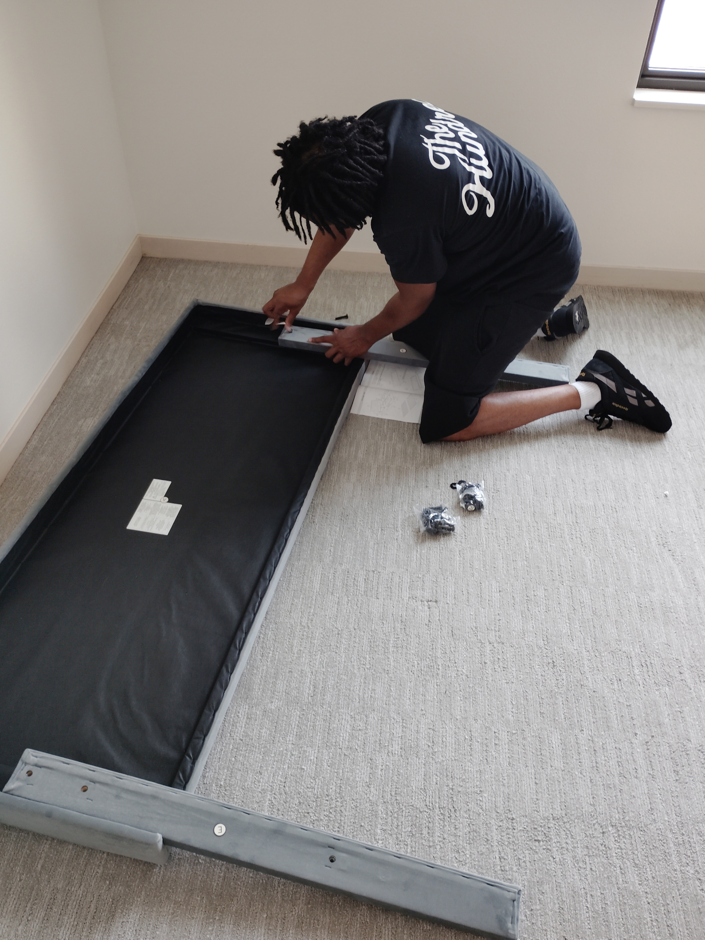 Assembling an upholstered platform bed frame on-site