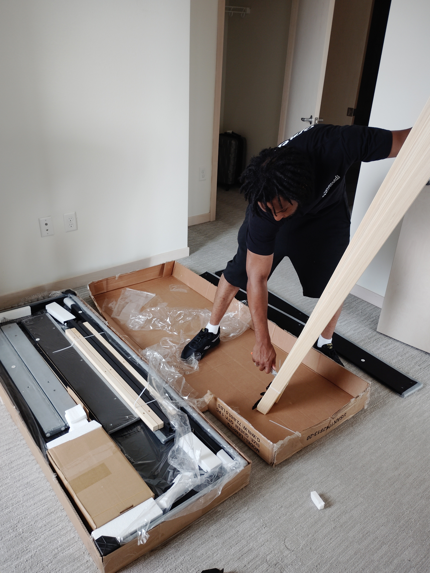 Sorting bed frame parts and hardware during an in-home furniture assembly